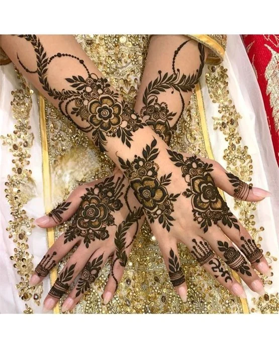 Creative Medallion Structure Blending Into Back Hand Mehndi Design Creative Medallion Structure Blending Into Back Hand Mehndi Design